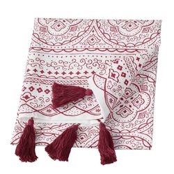 Orient en röd och vit kökshandduk i bomull med tofsar från Cult design, mått 50 x 70 cm.