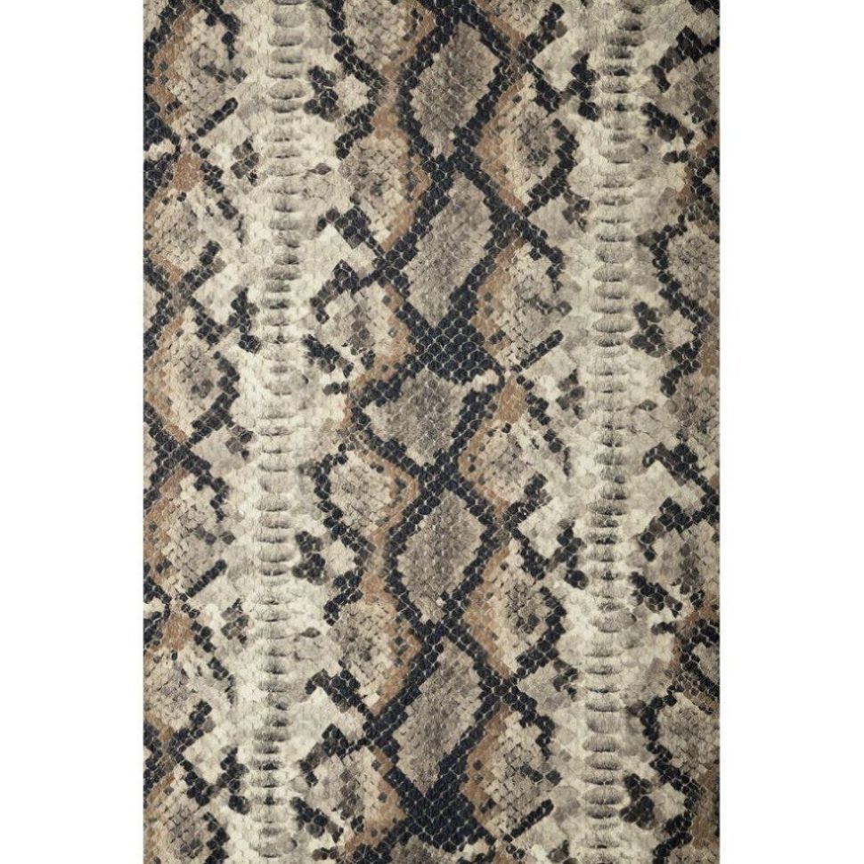 Snake en mjuk dubbelsidig pläd med ett ormskinnsmönster i beige och svart från Svanefors, mått 130 x 160 cm.