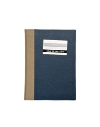 Lux en linjerad blå inbunden anteckningsblock A6 från Hedlunds.