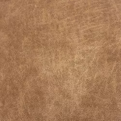 Möbelklassat konstläder på metervara. Martindale: 55000. Färg: Nougat.