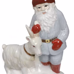 Jennys julbock som har fått sin inspiration från Jenny Nyströms julkort från Cult design, en porslinsfigur i vitt, grått och rött.