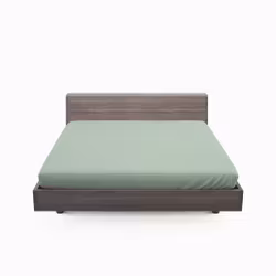 Milano ett ljusgrönt dra på lakan i bomull som även går att använda som sängtopp till madrasser, från Indusia design.