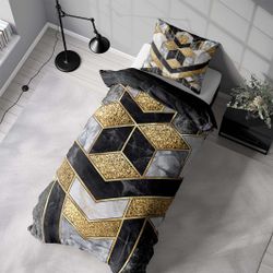 Marble art black ett påslakanset i bomull med ett marmormönster i svart, vitt och guld med dragkedja i botten, från Indusia design