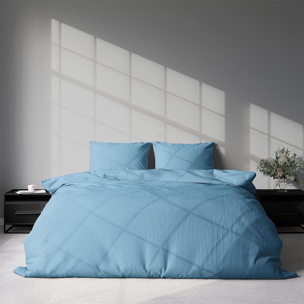 Milano ett ljusblått påslakanset till dubbeltäcke i bomull i storlek 200 x 220 cm med knäppning i botten, från Indusia design