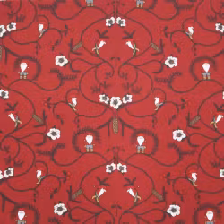 Nisse ett rött julgardinstyg/inredningstyg i bomull på metervara med ett tomtemönster från Redlunds textil bredd 153 cm
