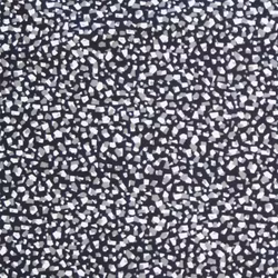 Assar en svart textilvaxduk med ett terazzomönster i vitt och grått på metervara i bredd 138 cm från Redlunds textil
