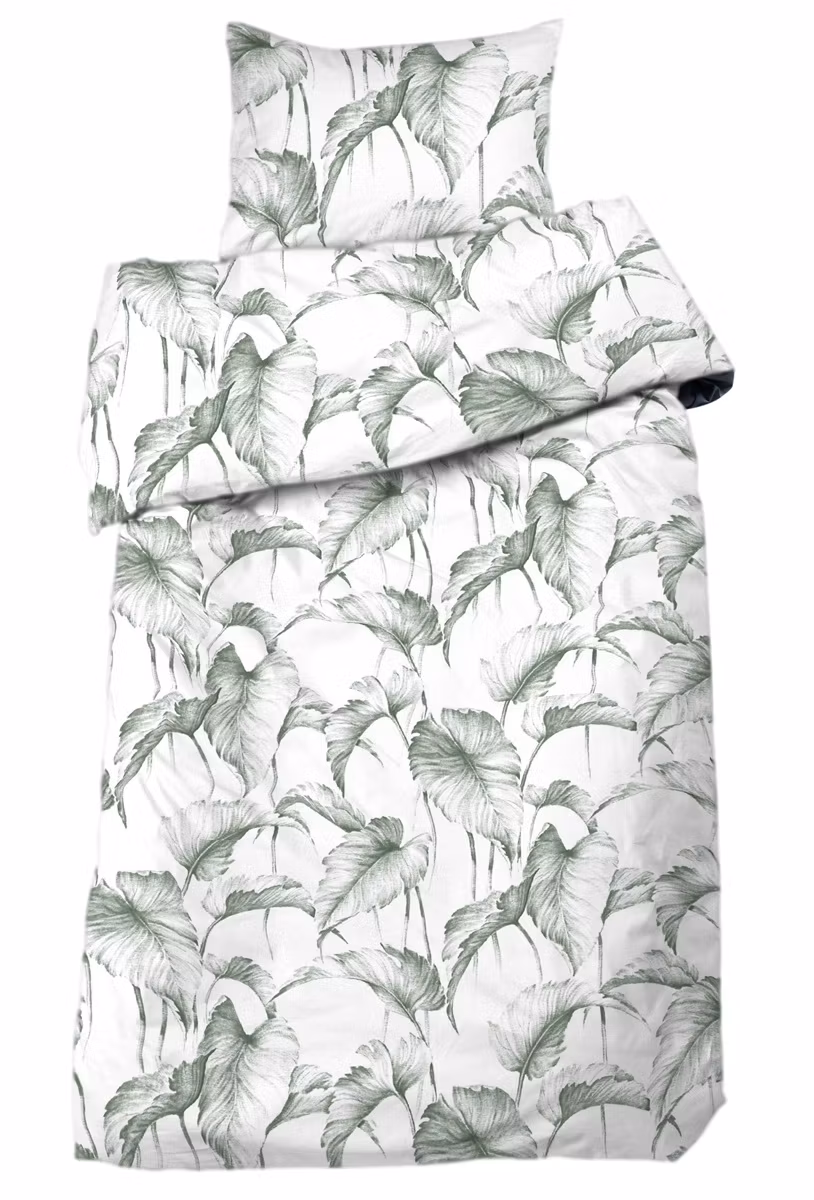 Sam ett stilrent bäddset i vitt med stora gröna blad i 100% bomull