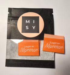 Laget av mormor dus oransje