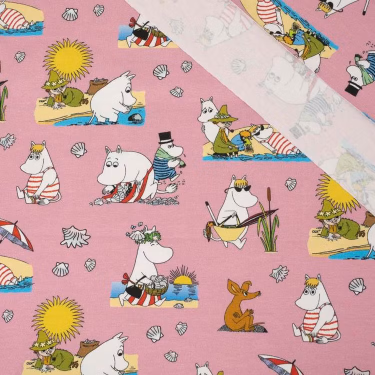 trikå tyg mumin  mönster stuvbit college trikåtyg licenstyg