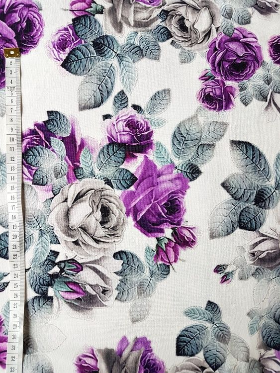 trikå tyg  mönster stuvbit college trikåtyg blommor lila vita