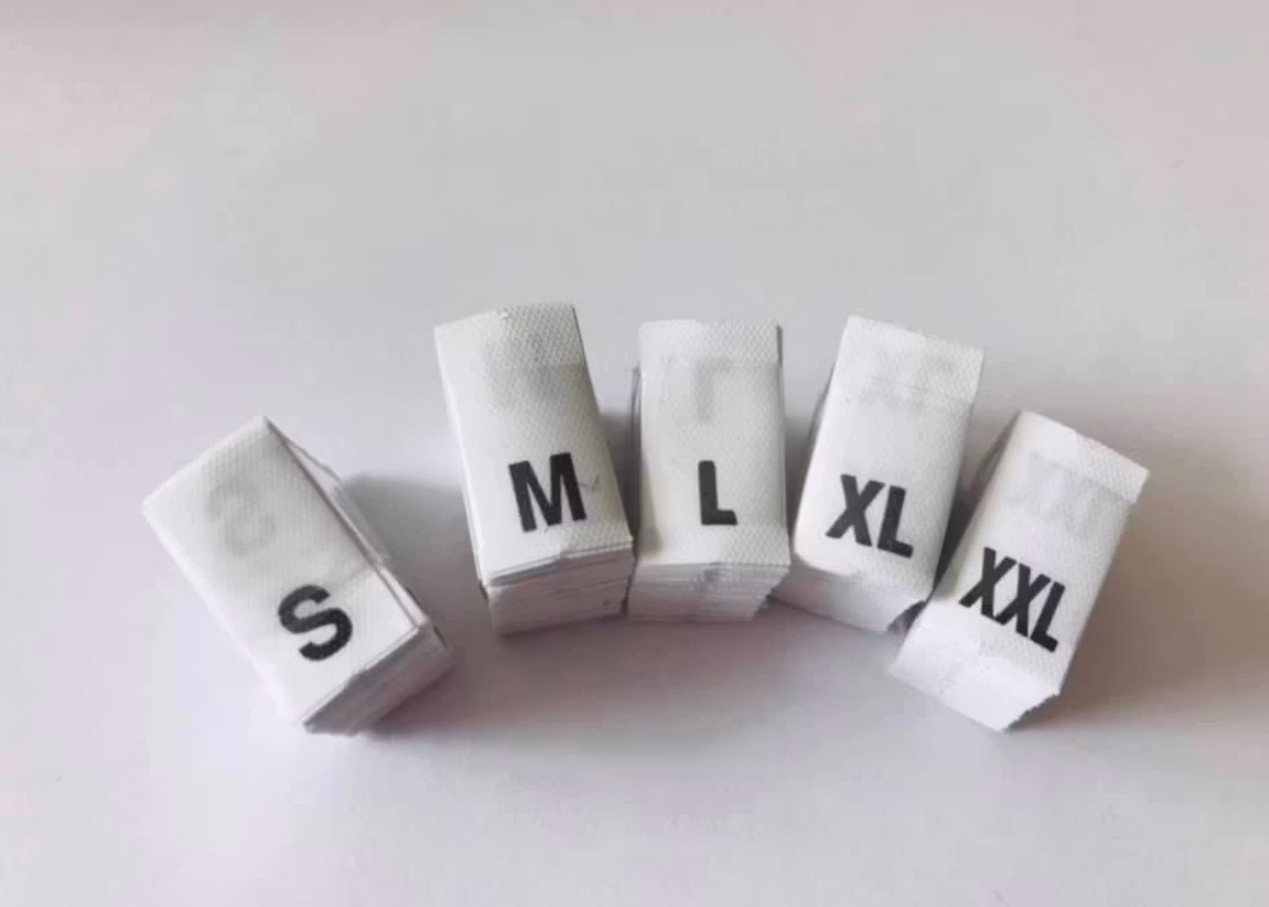 Storlekslappar S M L XL XXL