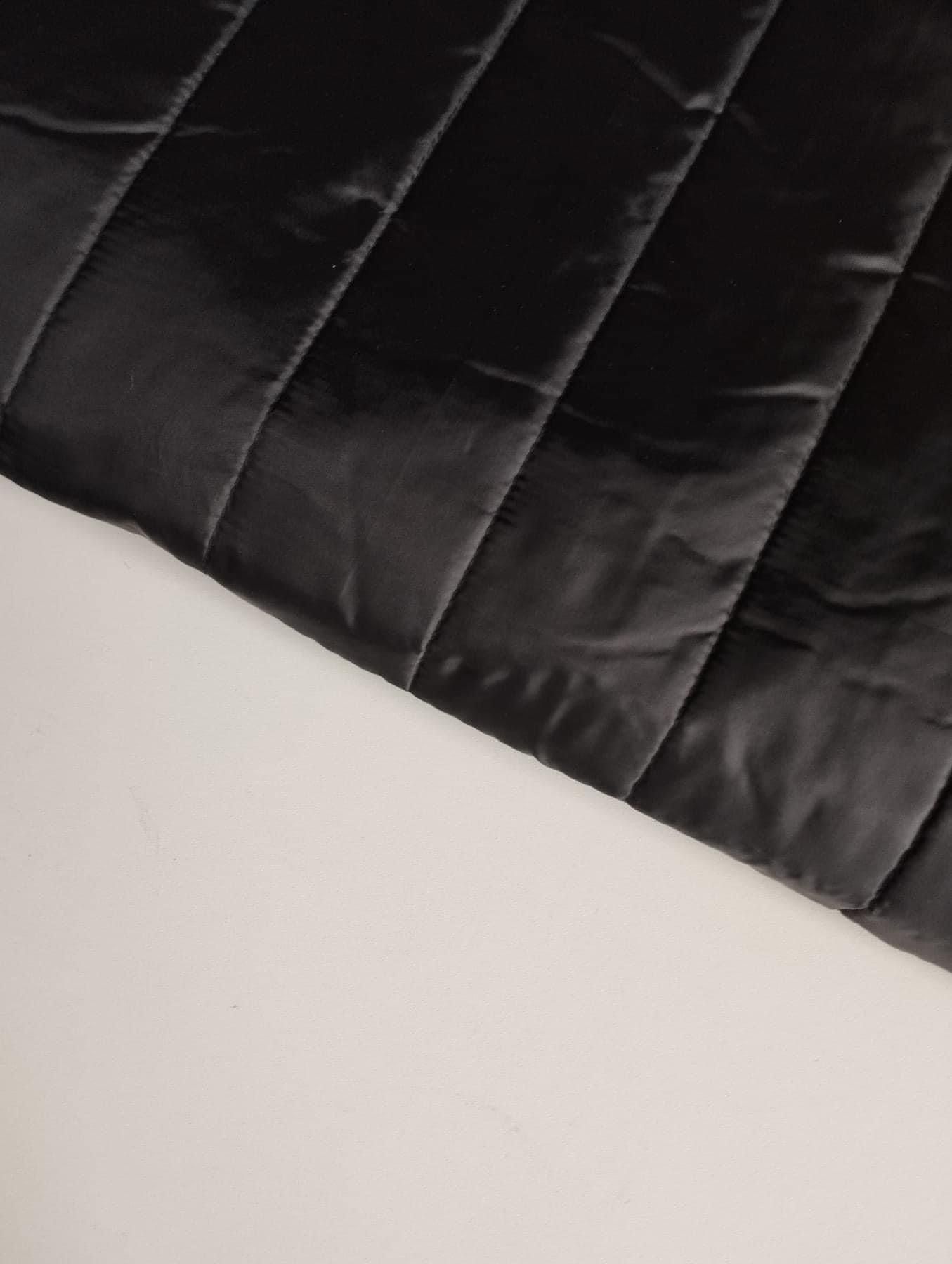 Quilt med foder Svart