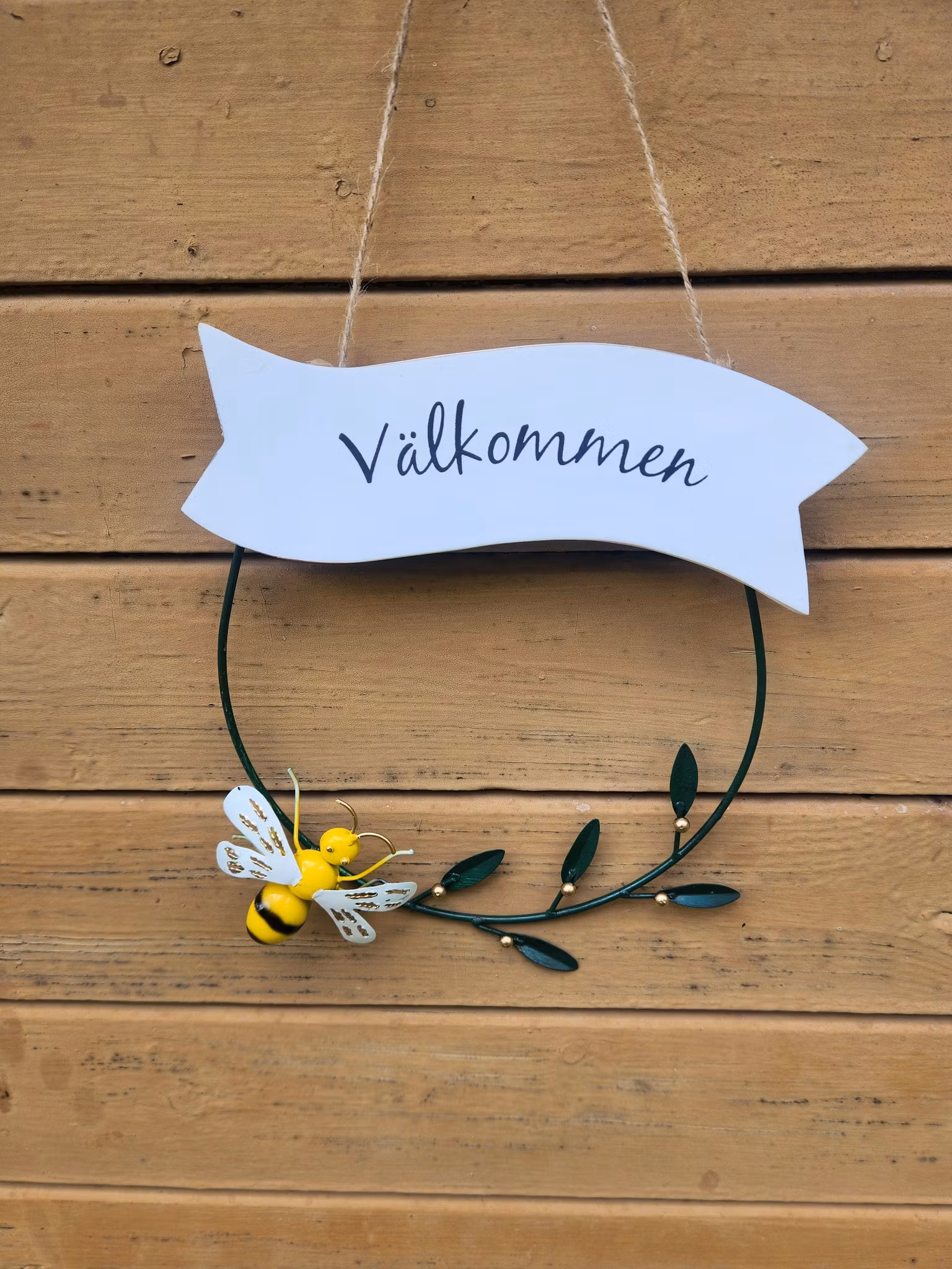 Välkommen krans med fjäril eller bi.