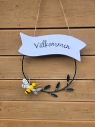 Välkommen krans med fjäril eller bi.