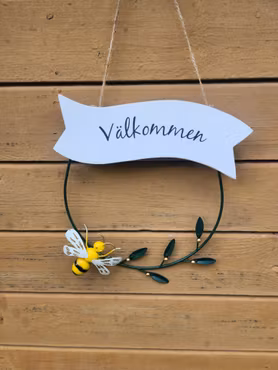 Välkommen krans med fjäril eller bi.