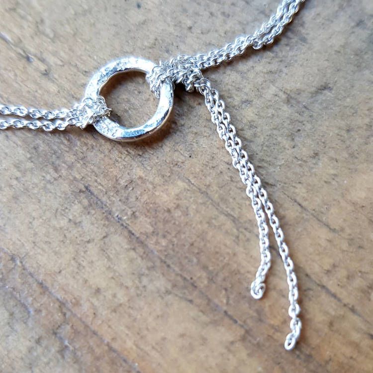 Silverarmband Connected, närblid hänge.