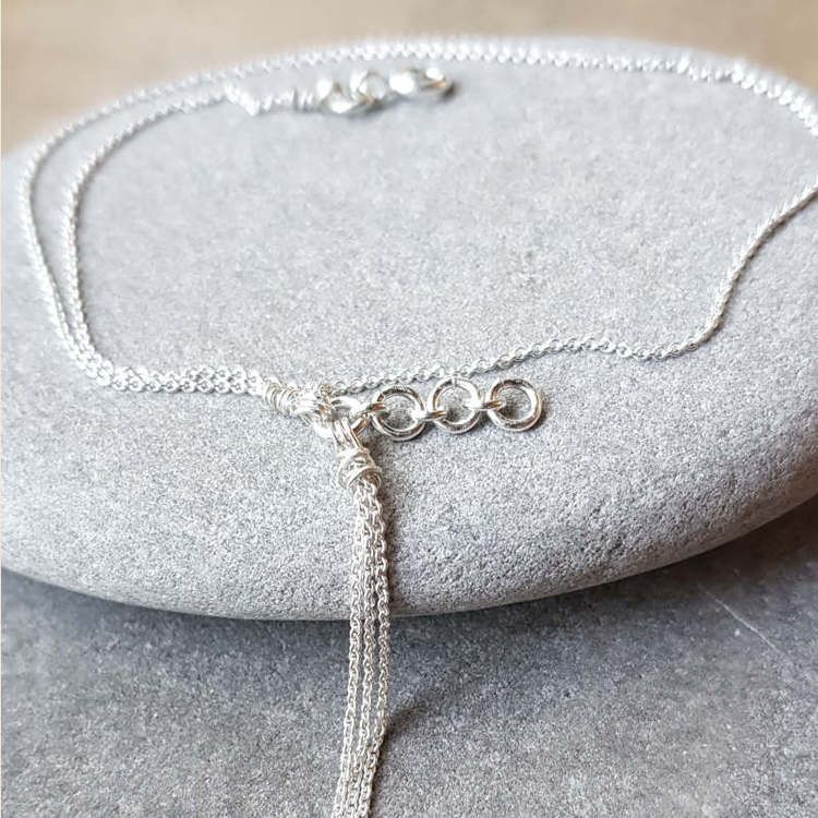 Fotlänk i silver, Feathers delight
