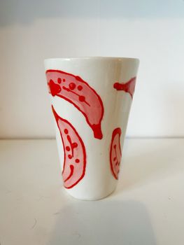 Hög mugg rosa banan