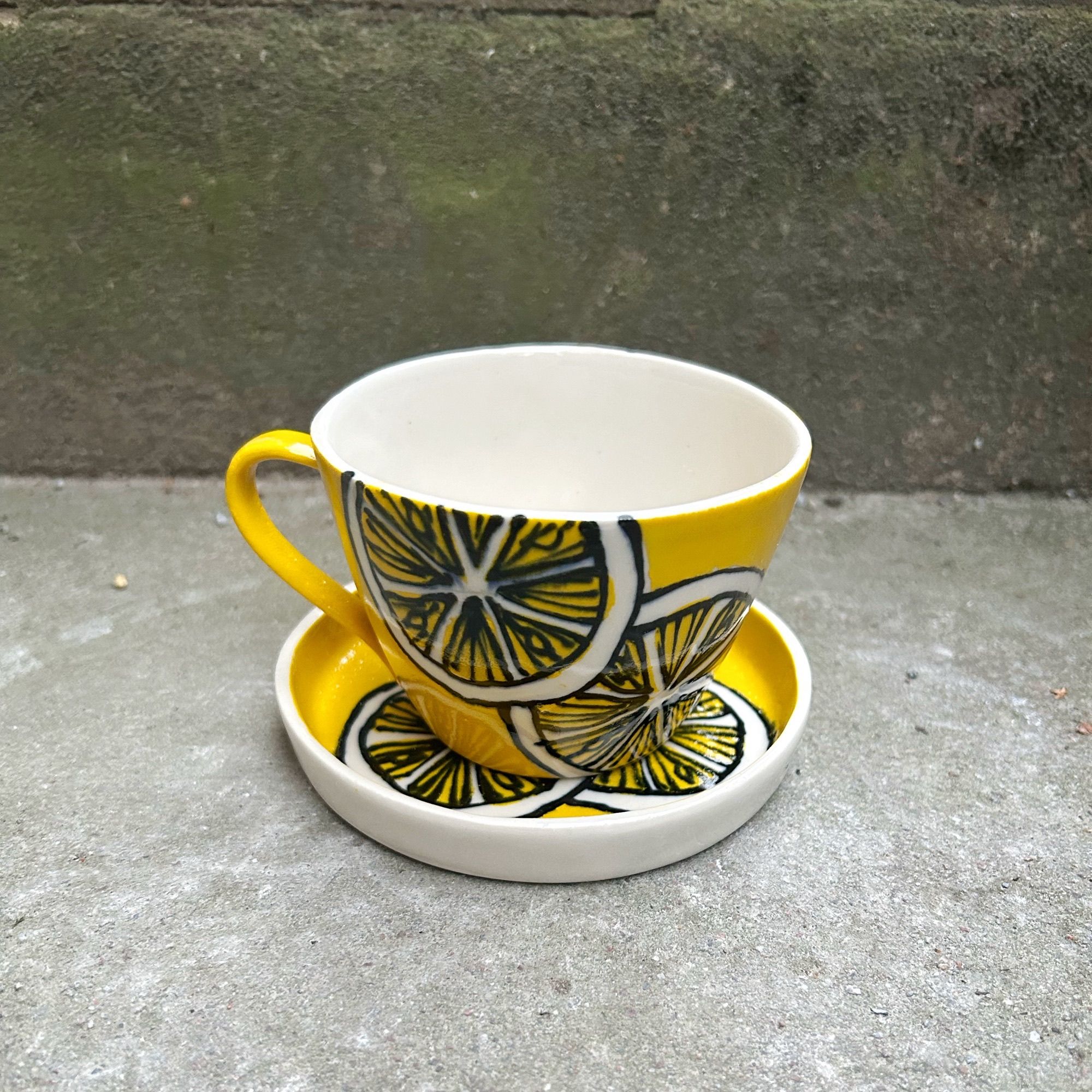 Kopp med fat gul citrus
