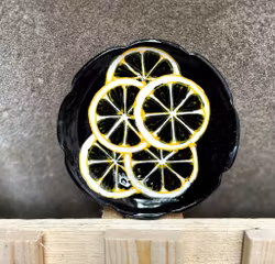 Assiett svart citrus