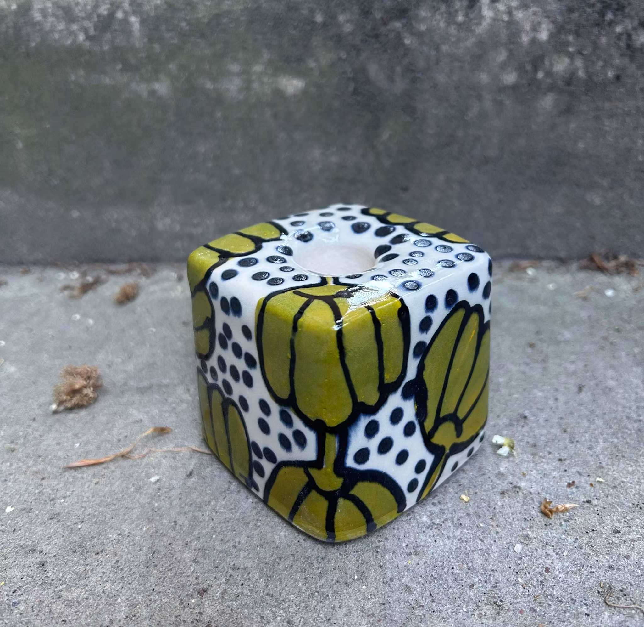 Ljusstake grön blomma