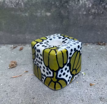 Ljusstake grön blomma
