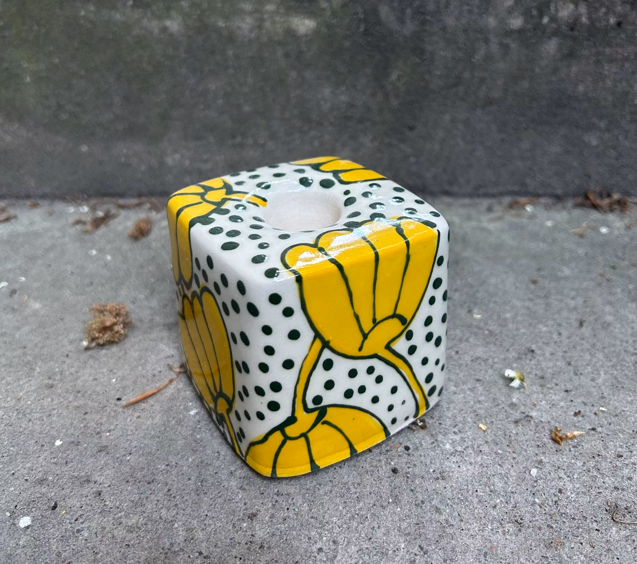 Ljusstake gul blomma