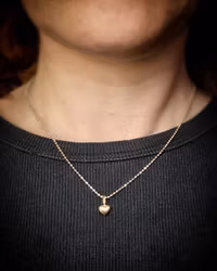 Tiny Heart - minihänge i 18K guld