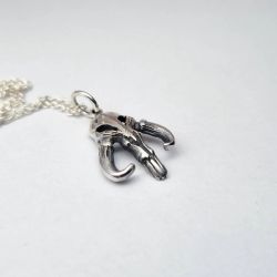 Mythosaur inspired scull silver pendant