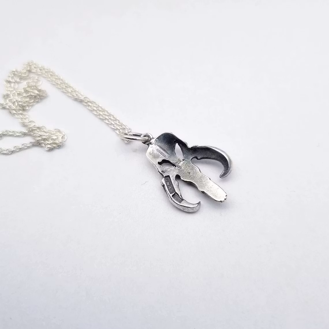 Mythosaur scull - hängsmycke i silver