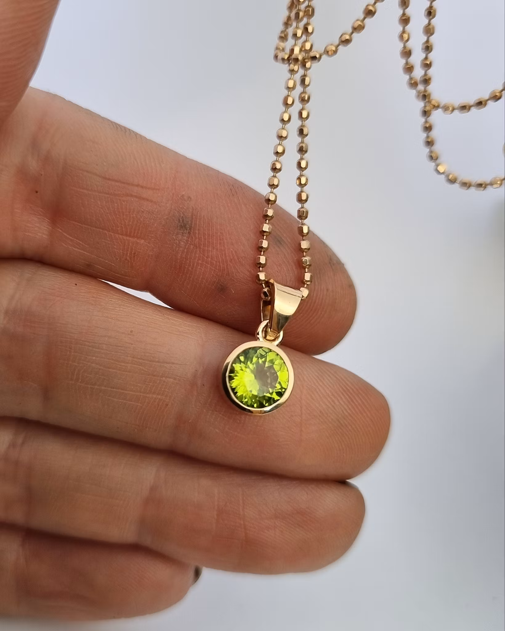 Fair Trade Peridot Mesa Verde - hänge i 18K guld