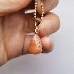 Solsten med Turmalin - hänge i 18K guld