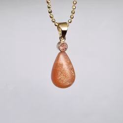 Solsten med Turmalin - hänge i 18K guld