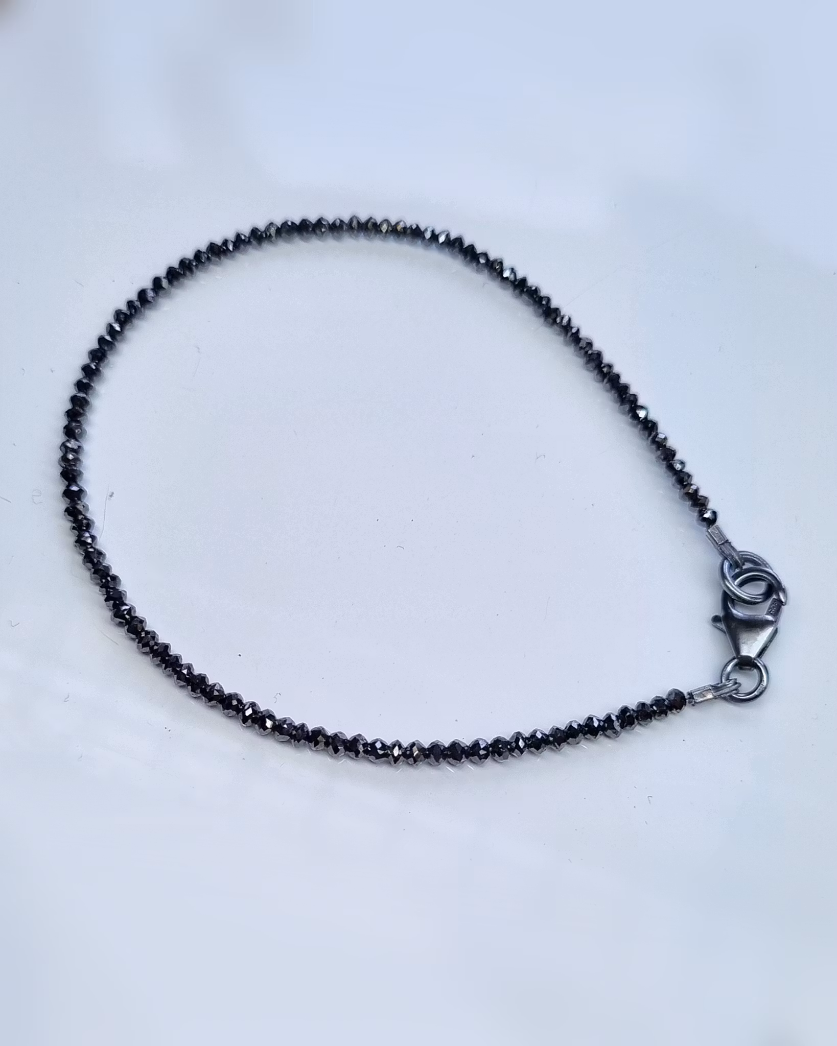 Gnistrigt svart Diamantarmband - till 20 cm