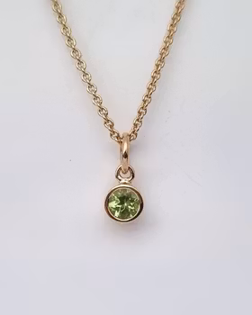 Peridot, Fairtrade - hängsmycke i 18K