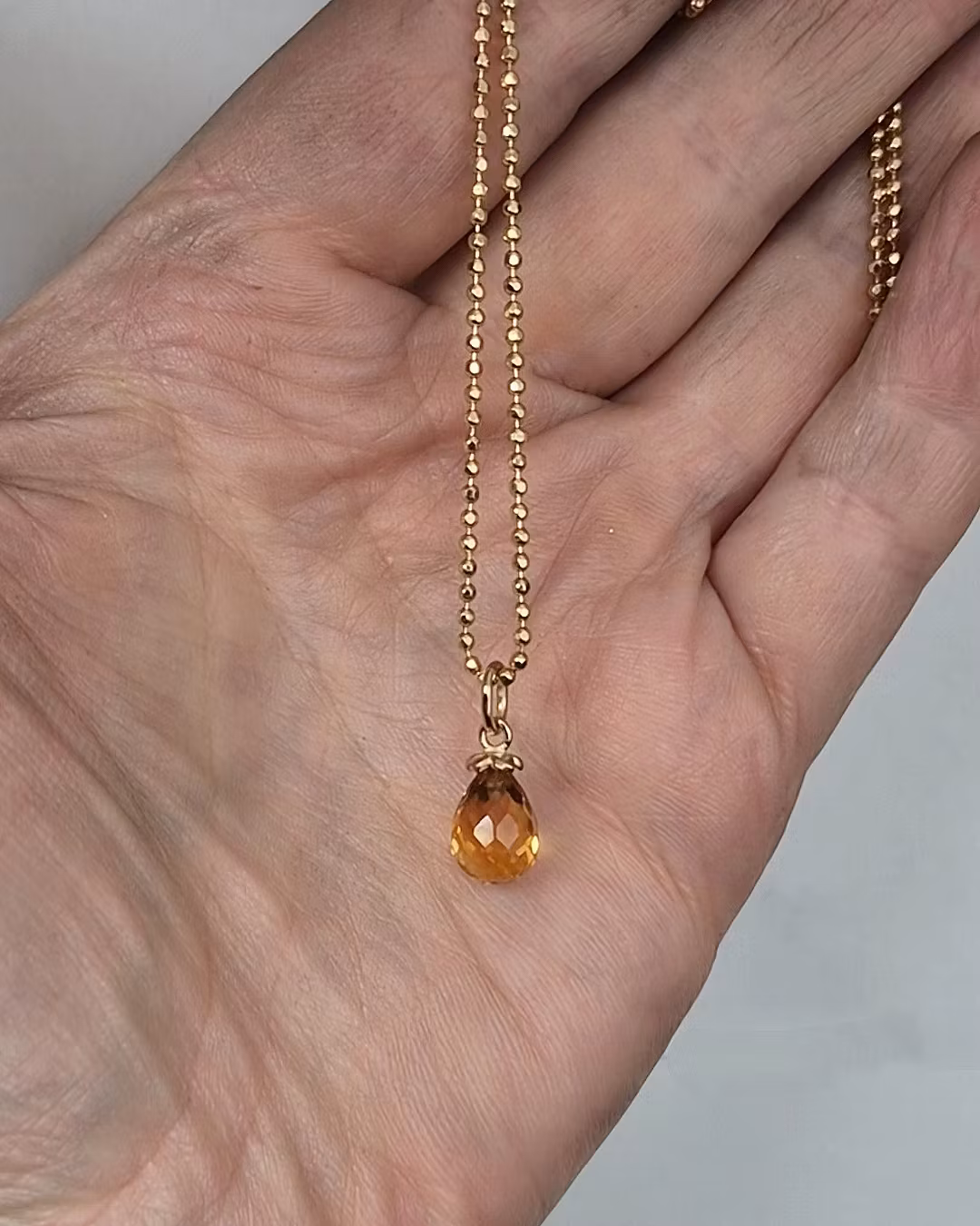 Citrin med Gullviva - hänge 18K guld