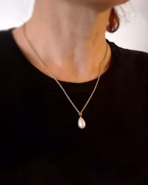 Sötvattenspärla med facetter - hänge i 18K guld