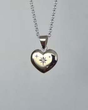 Handgraverat hjärta i 18K vitguld - vändbart hänge