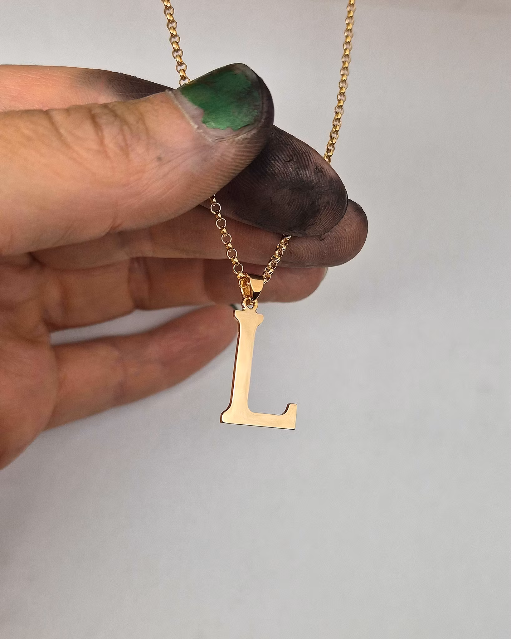 Bokstav "L" i 18K guld