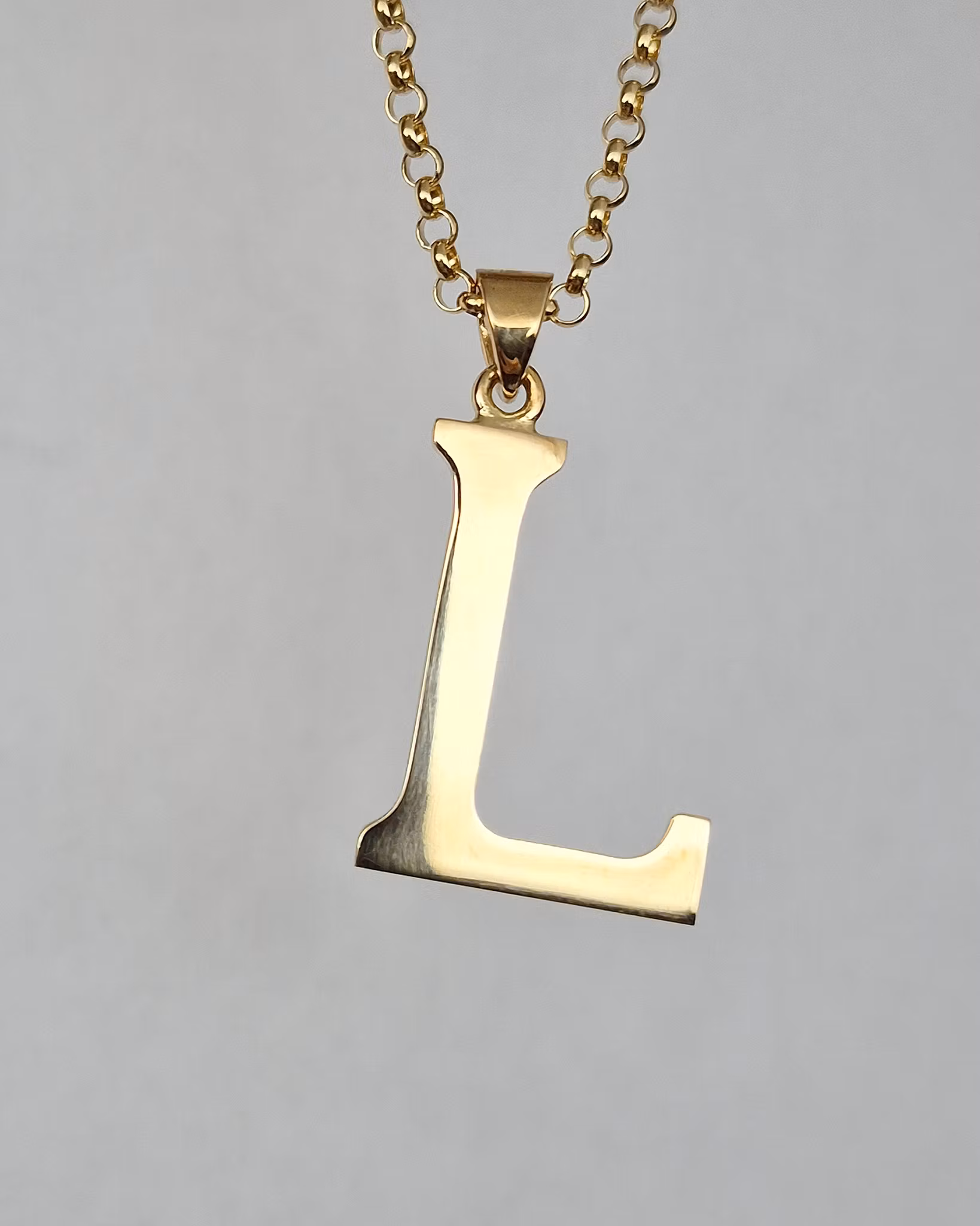 Bokstav "L" i 18K guld