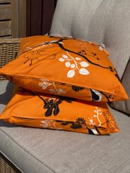 Orange/svart kuddfodral