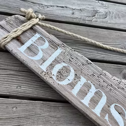 Blomsterbar - skylt av drivved