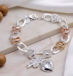 Hjärtats Nyckel Charmarmband
