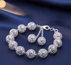 Drömska Silversfärer – Ett elegant filigranarmband