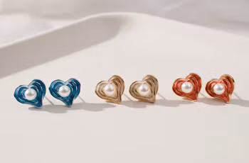 Pärlhjärtan i emalj