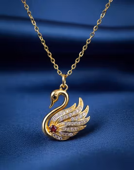 Gnistrande Svanen – Eleganta örhängen i guldton