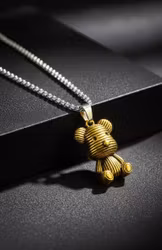 Gyllene Teddy-örhängen 🧸