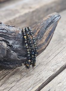 Falköga, armband 4mm runda pärlor