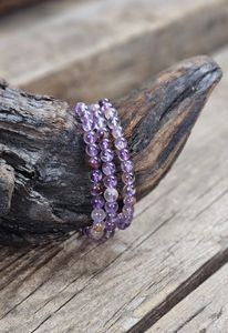 Super Seven Ametist, armband 6mm runda pärlor