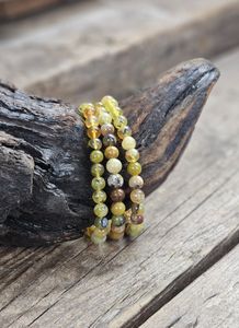 Gul Opal, armband 6mm runda pärlor